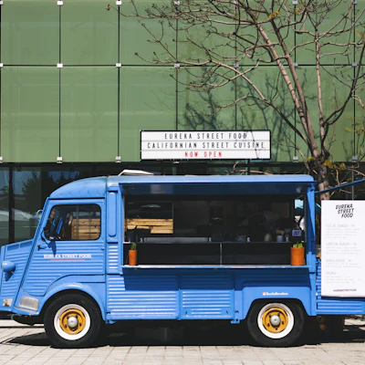 Rolling Comal, a fictional food truck — Tacos off the comal. Follow the blue truck.